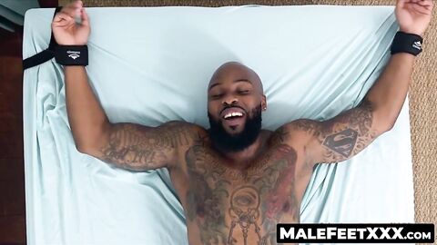 MaleFeetXXX.com - Hunky Dallas wakes up on the tickle table to a hairy guy tickling h