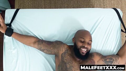 MaleFeetXXX.com - Hunky Dallas wakes up on the tickle table to a hairy guy tickling h