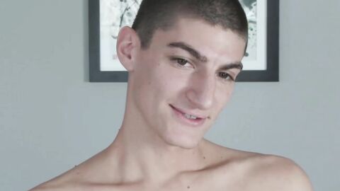 Slim stud Aiden Ward takes his cock and strokes it hard