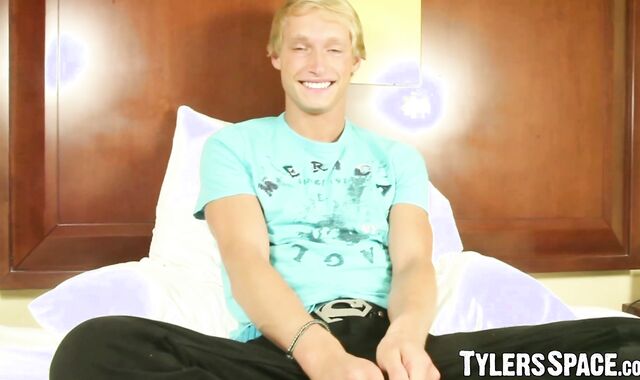Tanned blond jock plays with dildo and his cock hard for us