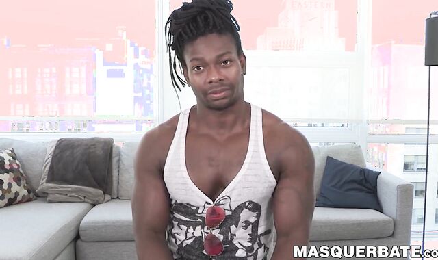 Black stripper Tommy Smith flexes his muscles before fleshlight
