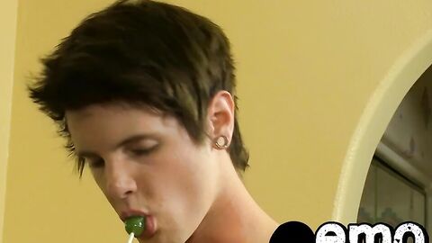 Lollipop sucking twink cums after riding big cock