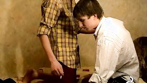 Twink enticed his bud into sucking his cock by smoking.