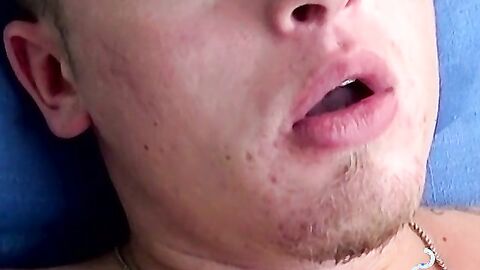 Handsome blonde explores his ass while blowing smoke