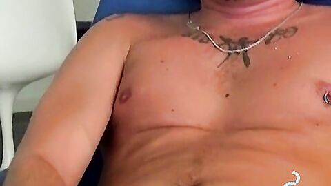 Handsome blonde explores his ass while blowing smoke