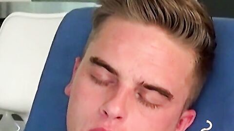 Handsome blonde explores his ass while blowing smoke