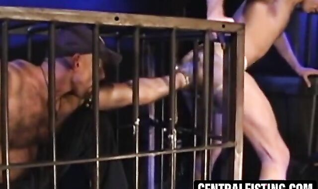 CentralFisting.com - Eric Evan fists jerek's ass through bars