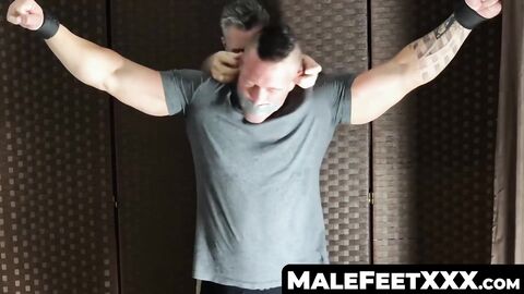 MaleFeetXXX.com - Bound muscular dude tickled by mature deviant