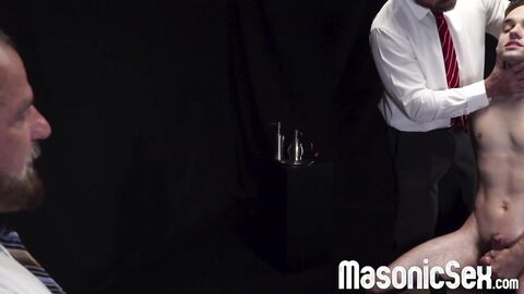 Attractive twink Marcus River rides monster dildos while watching 2 DILFs