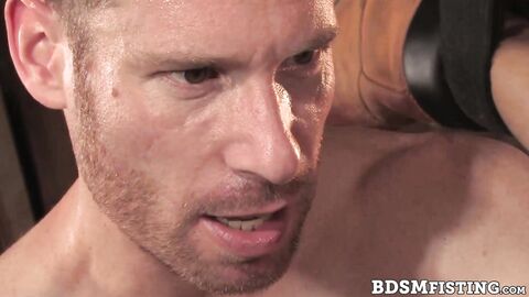 Erik Rhodes is on all fours in the tool shed, his asshole begging to be filled with B