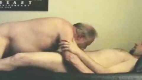 Silver-Bearded Daddy with His Young Cub