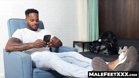 MaleFeetXXX.com - Kevin shows off his smooth and tasty feet while relaxing in style