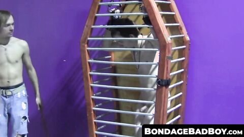 BondageBadBoy.com - Caged twink whipped and tormented hard ends up masturbating with