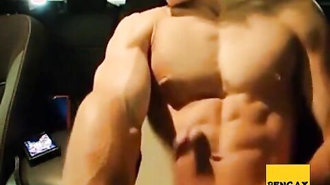 Big-Cocked Man Strokes in Car While Watching Porn