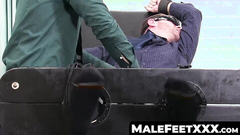 MaleFeetXXX.com - Bound and blindfolded hunk Sean Holmes endures feet tickling