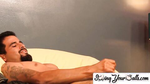 SwingYourBalls.com - Tattooed gay teases his big balls while stroking his thick cock