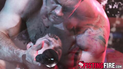 Muscled pervert Davin Strong bents over the officer on a table and explores his body