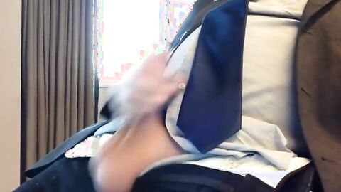 Suited Silver Fox Jerks Off Solo