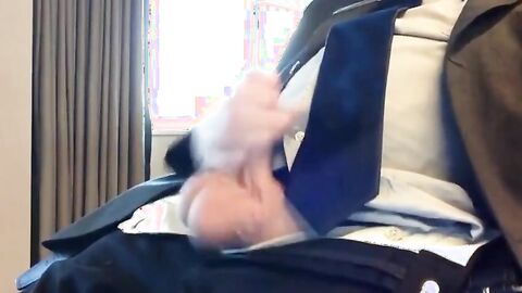 Suited Silver Fox Jerks Off Solo