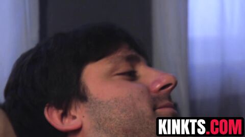 TS Foxxy hangs Rick Fantana and jerks his cock till he blows a load