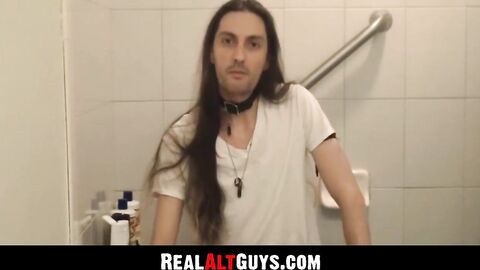RealAltGuys.com - Long-haired stud strokes his cock intensely while relaxing in the b