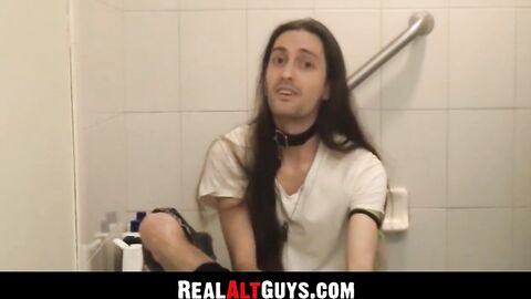 RealAltGuys.com - Long-haired stud strokes his cock intensely while relaxing in the b