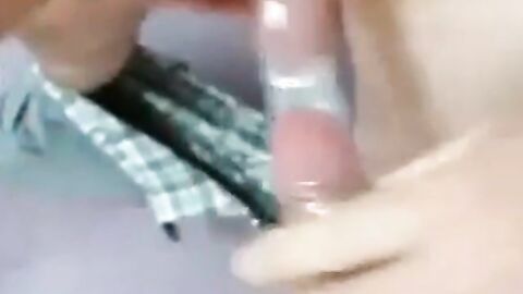 Two Guys Cum Together in a Condom