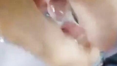 Two Guys Cum Together in a Condom