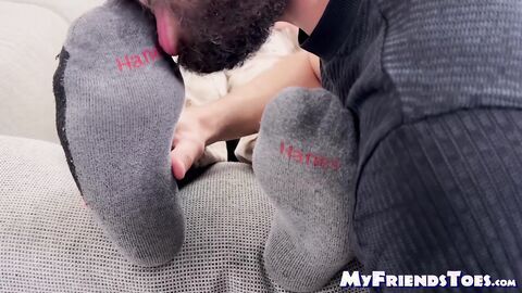 Scott Holliday relaxes while Thom worships his massive feet