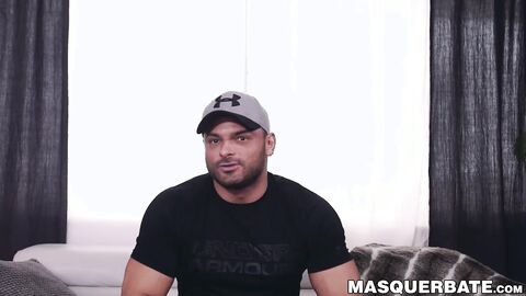 Brawny Jeremy moves his hand up and down while holding his dick