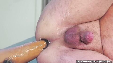 Naughty Christian Mitchell has his asshole fisted by Alson Caramel