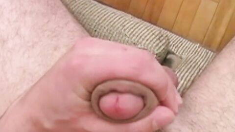 Masked stud shows off his muscles while jerking off his dick