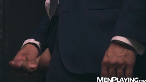 Suited Hector de Silva and Josh Milk use gloryhole for breeding