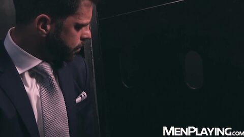 Suited Hector de Silva and Josh Milk use gloryhole for breeding