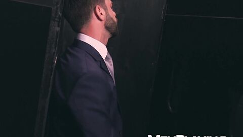 Suited Hector de Silva and Josh Milk use gloryhole for breeding
