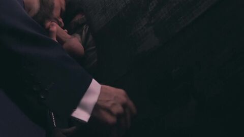 Suited Hector de Silva and Josh Milk use gloryhole for breeding