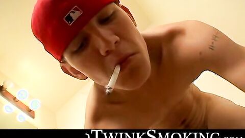 Smooth Lex rocks cock and puffs smoke in the bathroom
