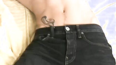 Tattooed Andrew blows a hot load after rubbing and stroking his long dick