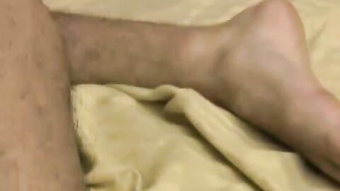 Tattooed Andrew blows a hot load after rubbing and stroking his long dick