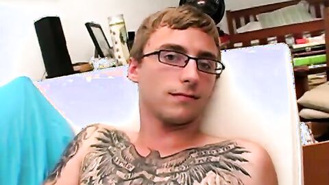 Cutie Owen flexed his ink before massaging his cock and fingering his hole