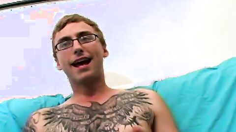 Cutie Owen flexed his ink before massaging his cock and fingering his hole