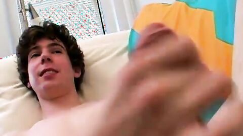 Lustful Jake jacked his giant uncut dick on the couch