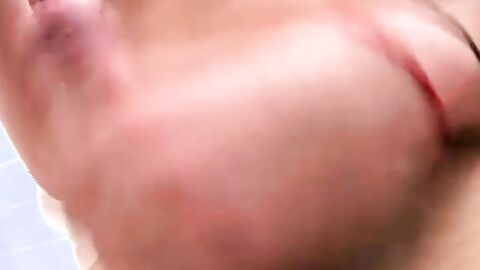 Dirty Tyler sits in the tub and starts jerking his thick uncut cock