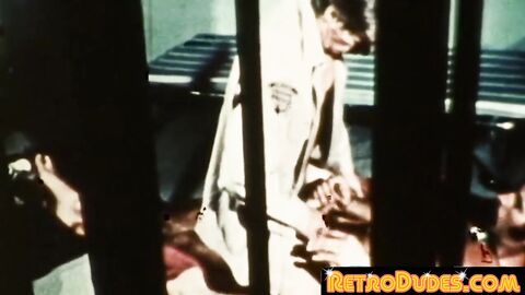 RetroDudes.com - Horny vintage police rides convict cock between the bars