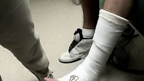 Foot cast placed on twink and his leg before being taken off