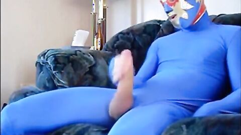 Masked Guy in Blue Zentai Suit Strokes Big Cock