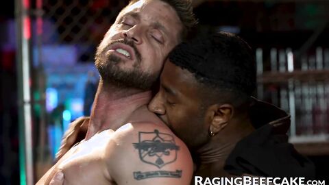 Johnny Ford bends over so black stallion can rim and bareback him