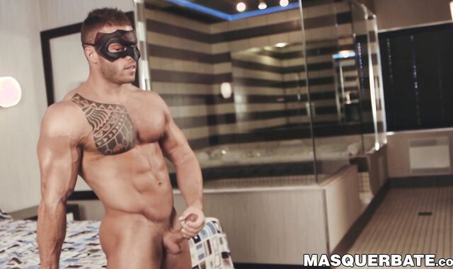 Muscular masked gay stud Devon Dexx masturbates solo