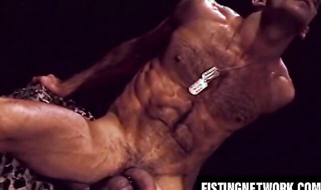 Kinky gay sucks cock while fist fucking his gaping hole