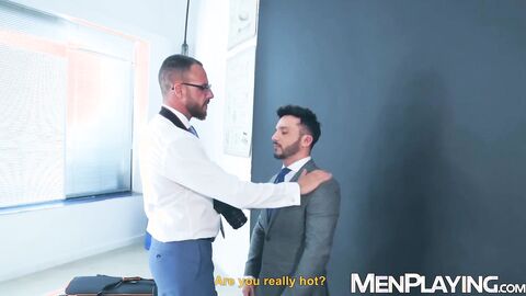Cheeky Kike Gil kneels and blows muscular Leo Rossos big dick
